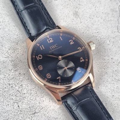 IWC 포르투기저 샤프하우젠 핸드와인드 블랙 다이얼 골드 시계